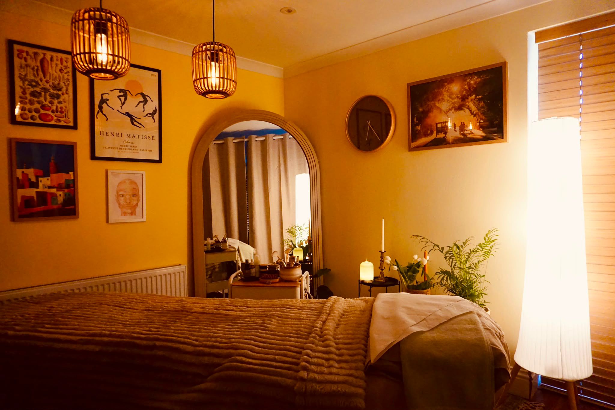 Mukha Face Yoga — warm, candlelit treatment room